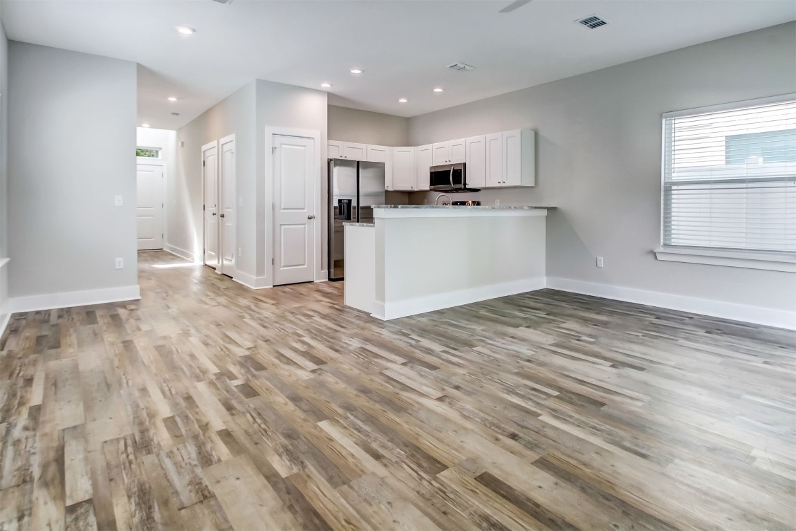 926 South 7th Street Fernandina Beach, FL 32034 - Photo 12 of 37 a view of kitchen with wooden floor