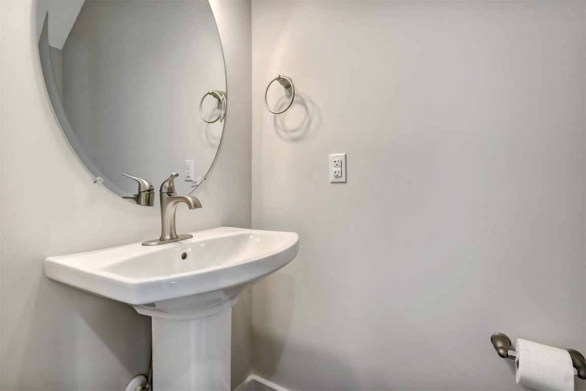 926 South 7th Street Fernandina Beach, FL 32034 - Photo 16 of 37 a bathroom with a sink and mirror