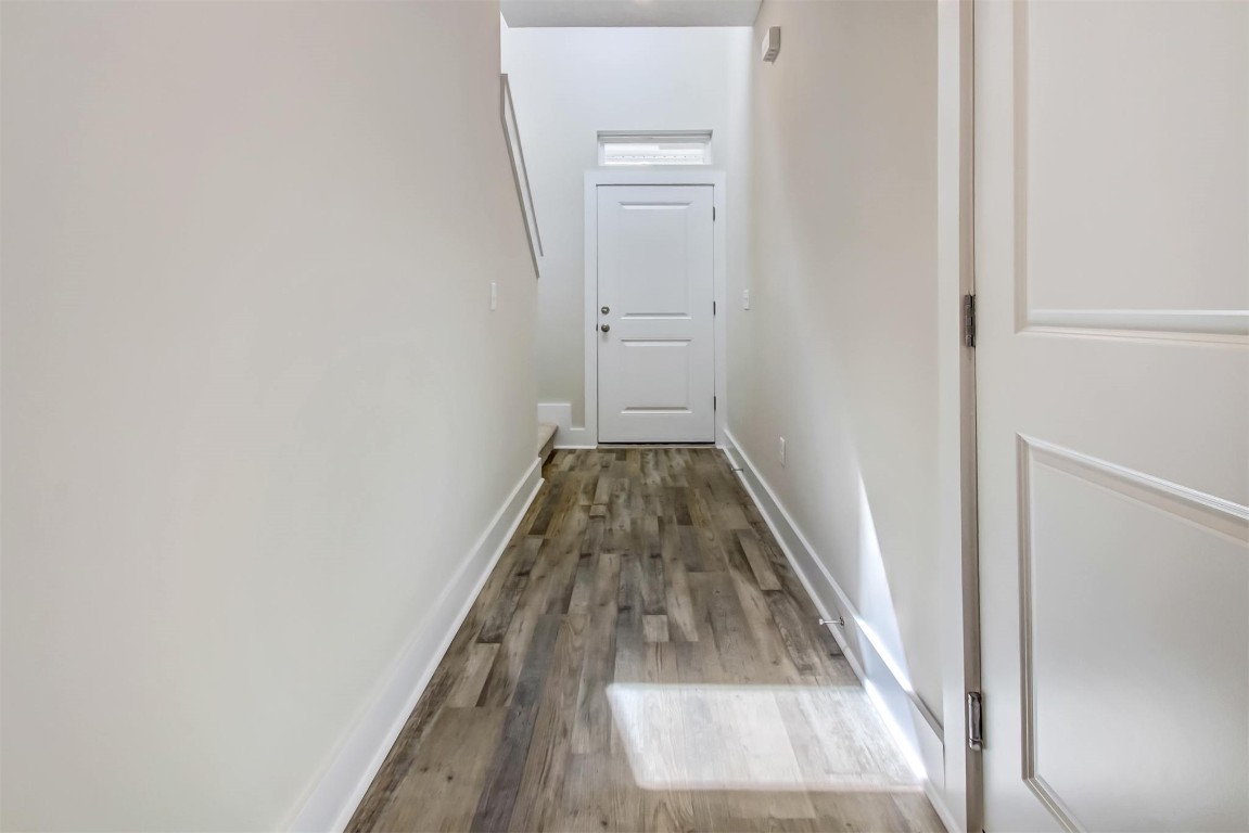 926 South 7th Street Fernandina Beach, FL 32034 - Photo 17 of 37 a view of a hallway with wooden floor