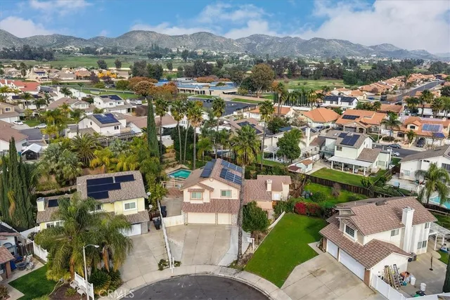an aerial view of a city with lots of residential buildings