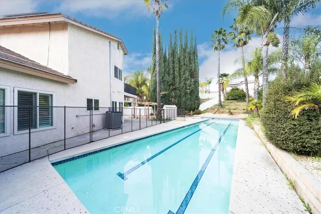 a view of a house with a swimming pool