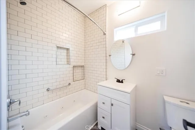 a bathroom with a sink a bathtub and a shower