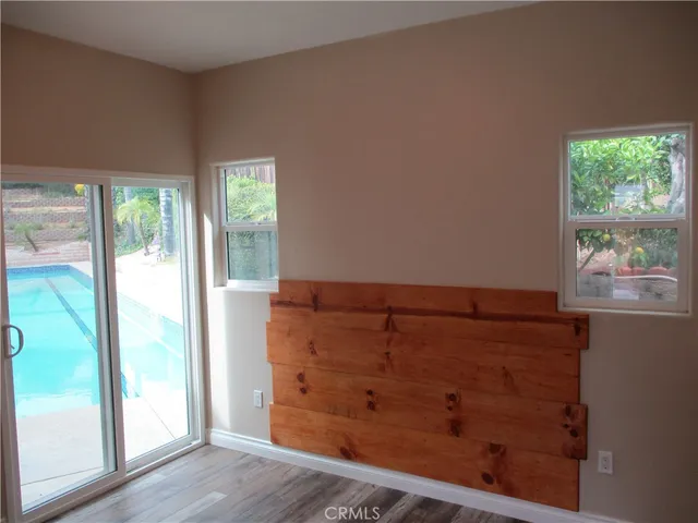 a white toilet sitting next to a white sink