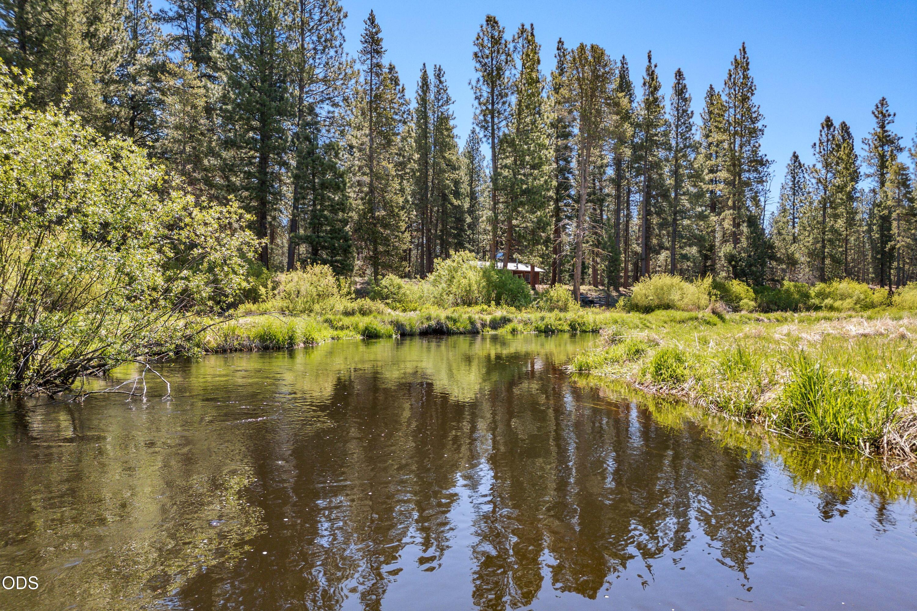 50910 Masten Road La Pine, OR 97739 - Photo 19 of 44 a view of a lake with trees