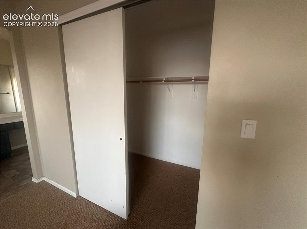 628 Prairie Star Circle Colorado Springs, CO 80916 - Photo 28 of 37 Closet in primary bedroom