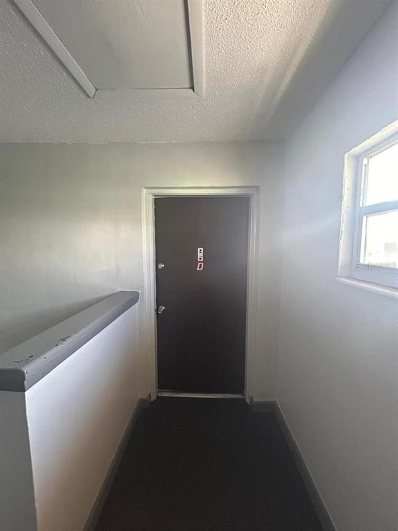 1627 West Oak Ridge Road, Unit D Orlando, FL 32809 - Photo 4 of 17 a view of hallway
