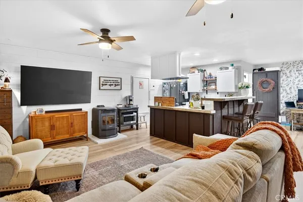 a storage room with water heater and racks