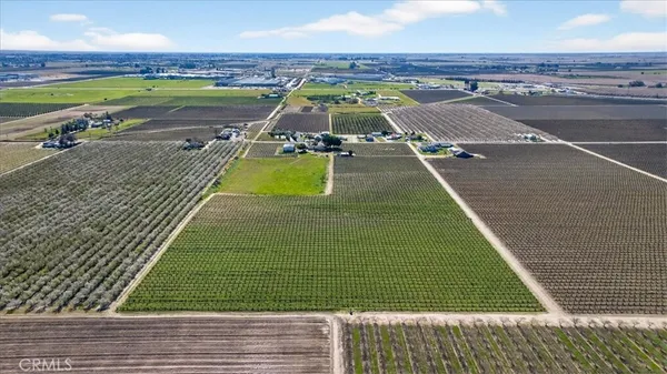a view of a backyard with a patio