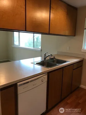 a utility room with washer and dryer