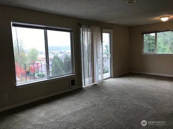 an empty room with windows