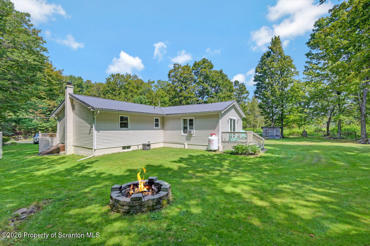 3660 Aberdeen Road Moscow, PA 18444 - Photo 60 of 68 a front view of house with a garden