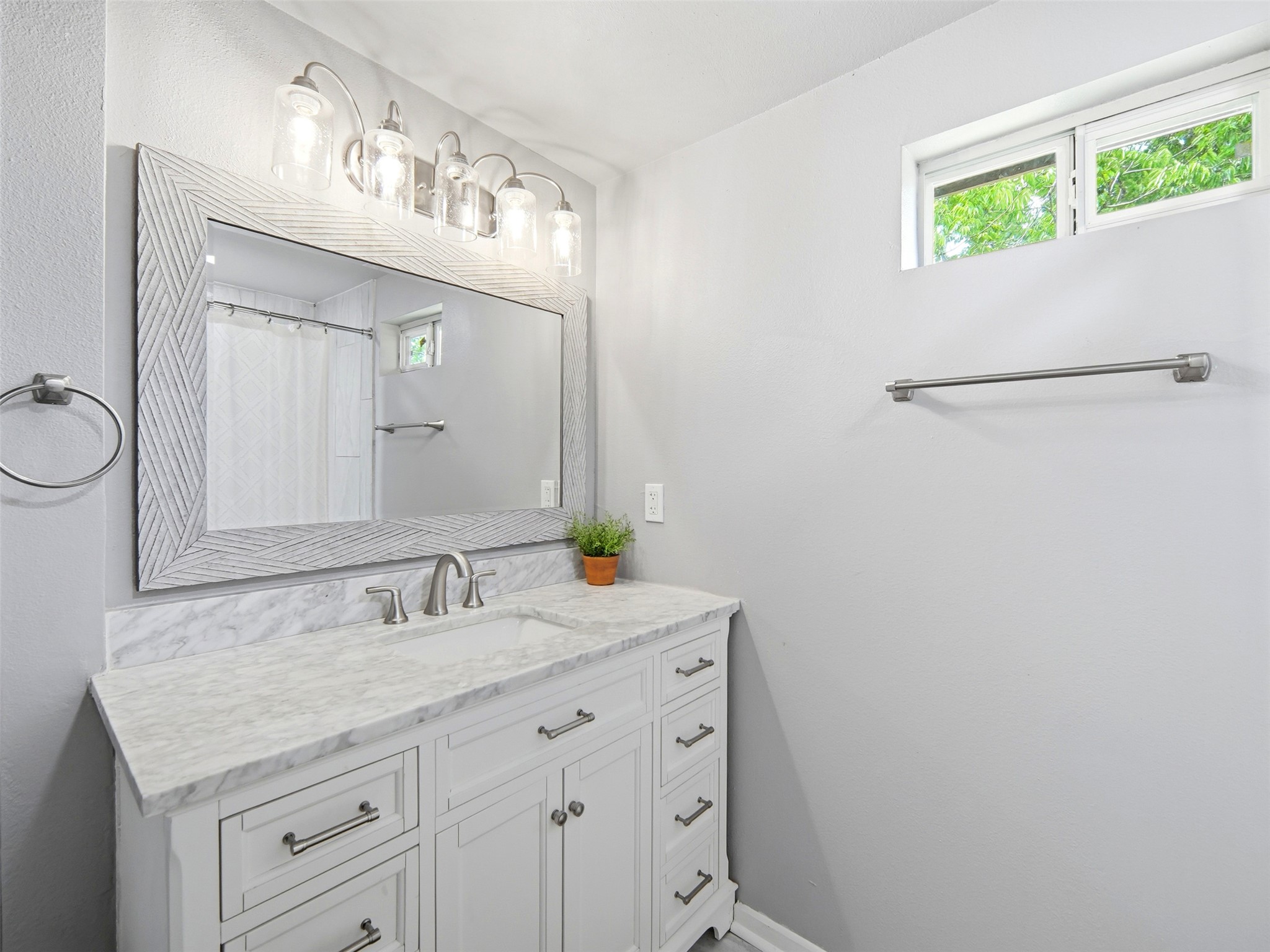 700 9th Street Blanco, TX 78606 - Photo 18 of 33 a bathroom with a sink and a mirror