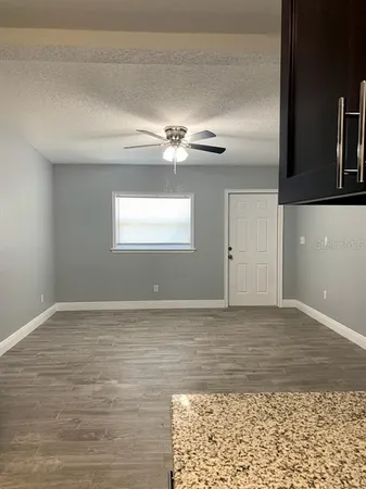 a view of a livingroom with a window
