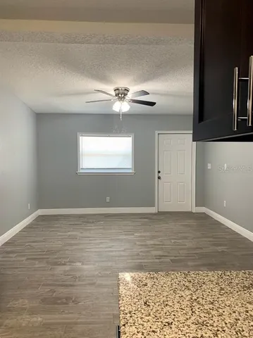 a view of a livingroom with a window