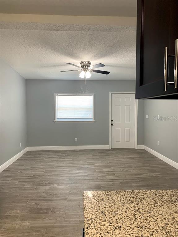 415 West Lancaster Road, Unit 2 Orlando, FL 32809 - Photo 7 of 9 a view of a livingroom with a window
