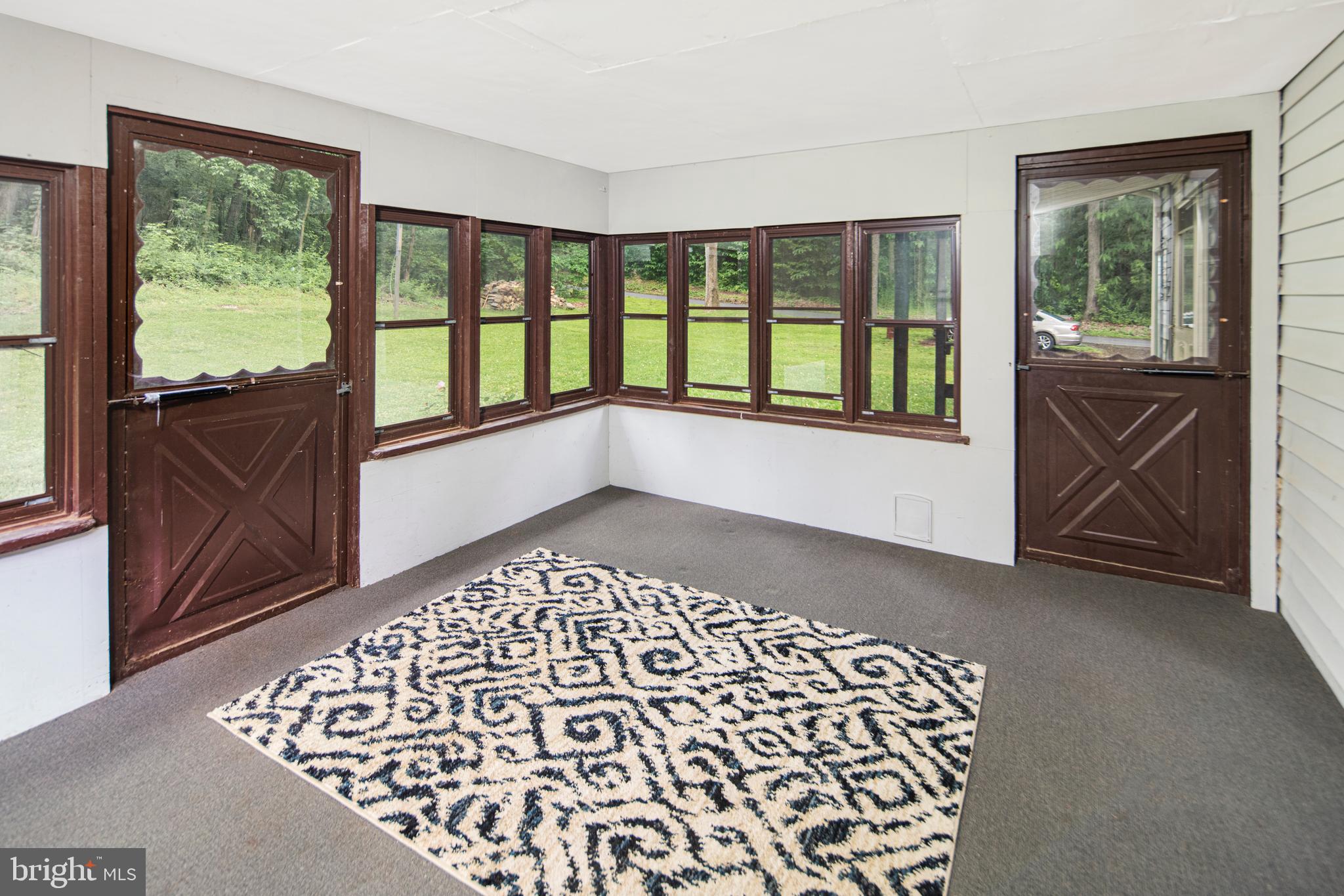 15403 Falling Waters Road Williamsport, MD 21795 - Photo 17 of 23 Versatile sun room area