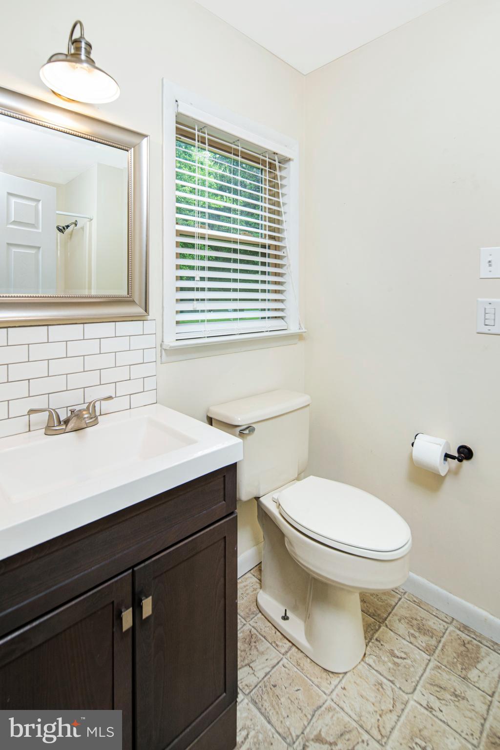 15403 Falling Waters Road Williamsport, MD 21795 - Photo 10 of 23 Guest bath with subway tile accents