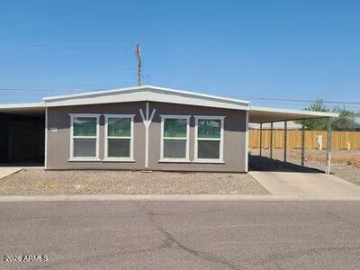 a front view of a house with a outdoor space