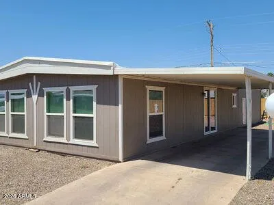 a front view of a house with a porch