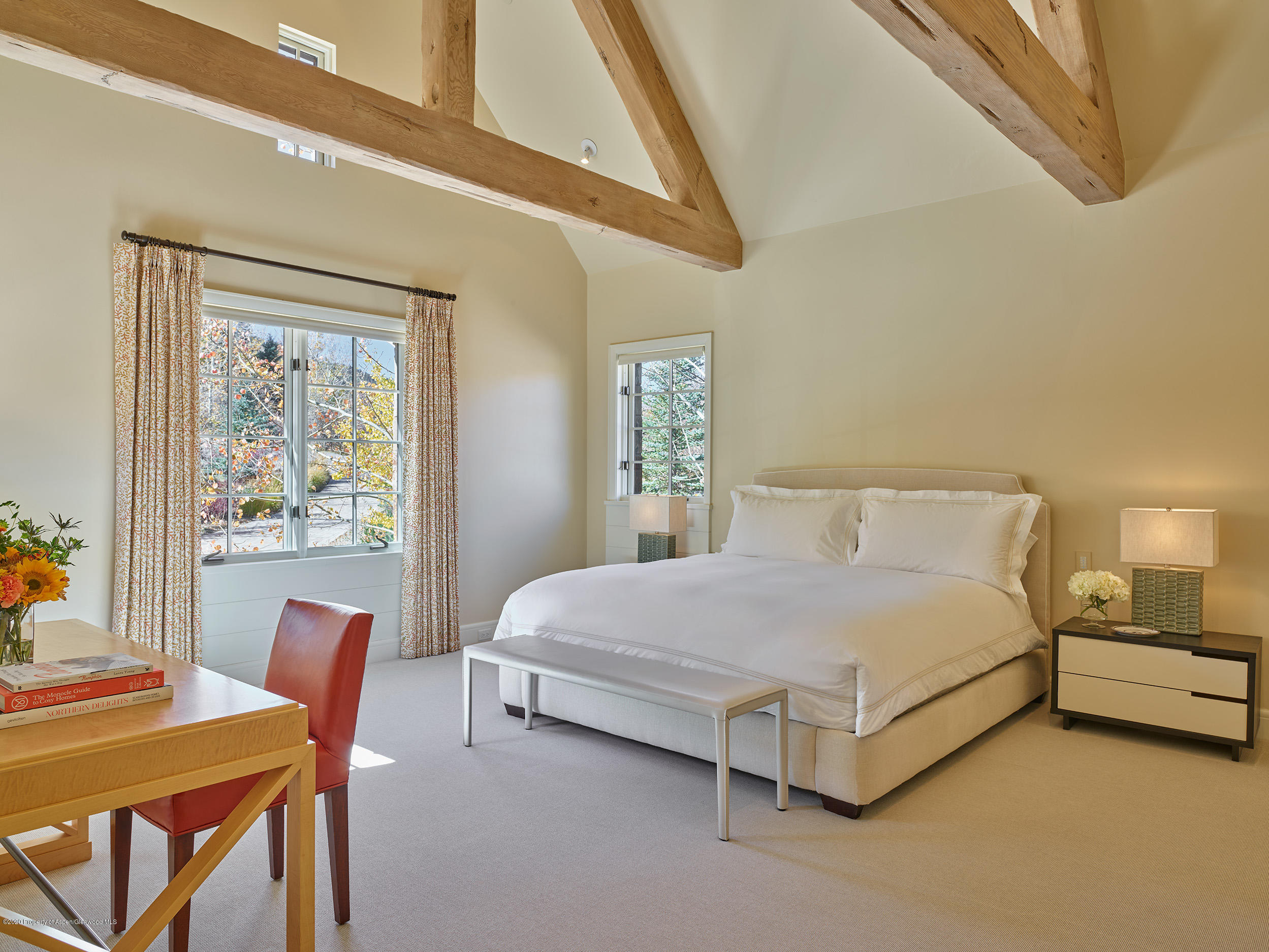 864 Moore Drive Aspen, CO 81611 - Photo 15 of 37 a bedroom with a bed chair and a window