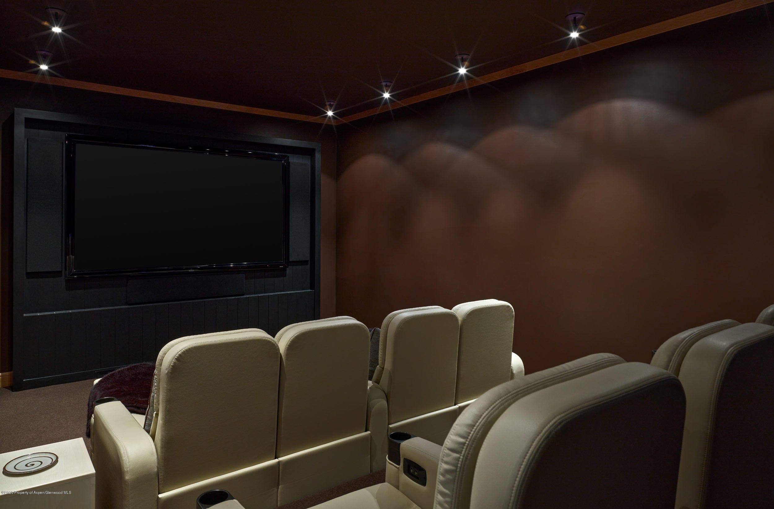 864 Moore Drive Aspen, CO 81611 - Photo 23 of 37 a balcony with furniture and a projector screen