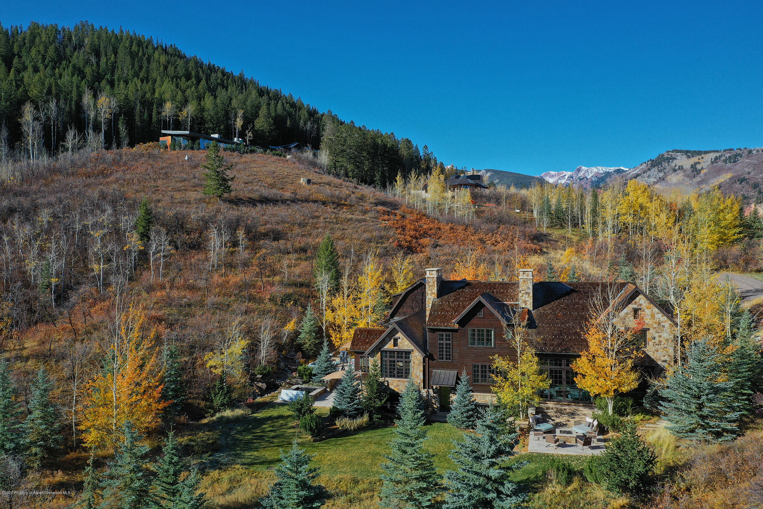 864 Moore Drive Aspen, CO 81611 - Photo 28 of 37 a view of a house with a yard