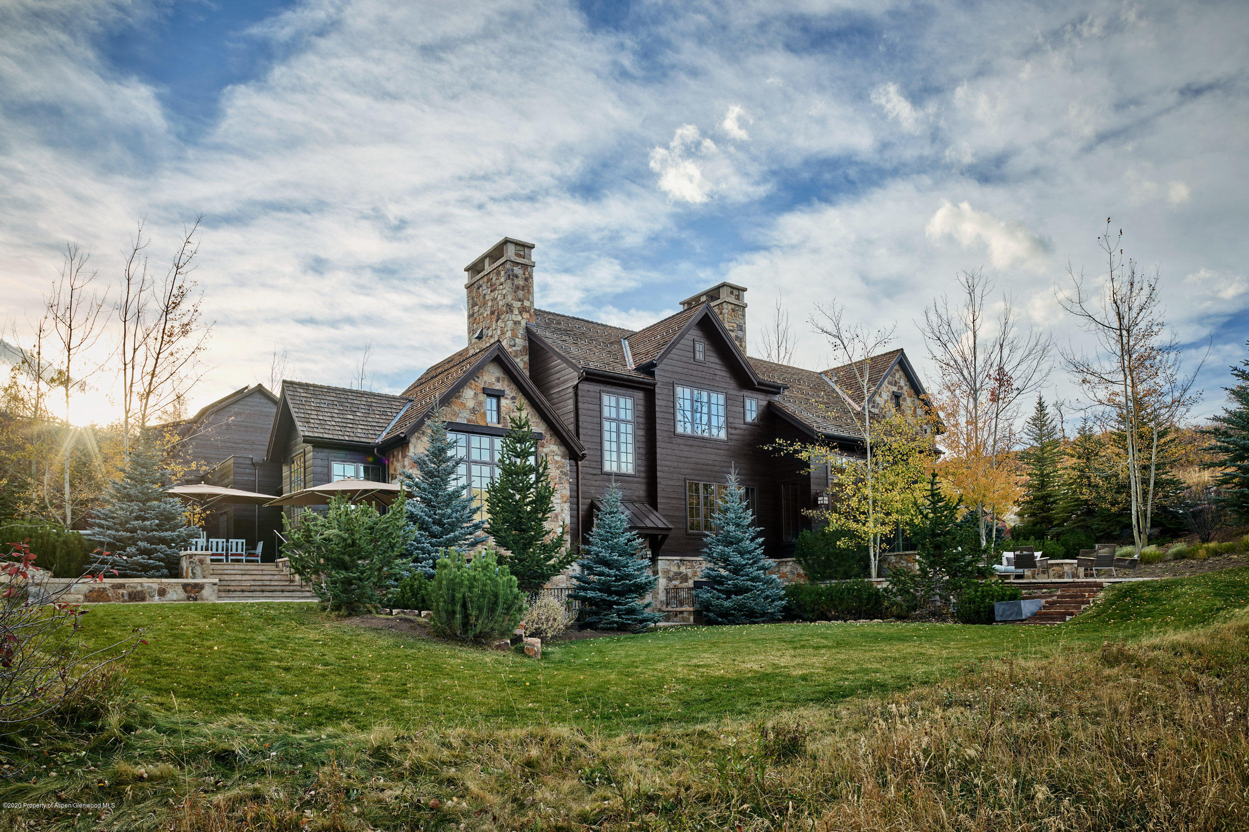864 Moore Drive Aspen, CO 81611 - Photo 29 of 37 a front view of a house with a garden