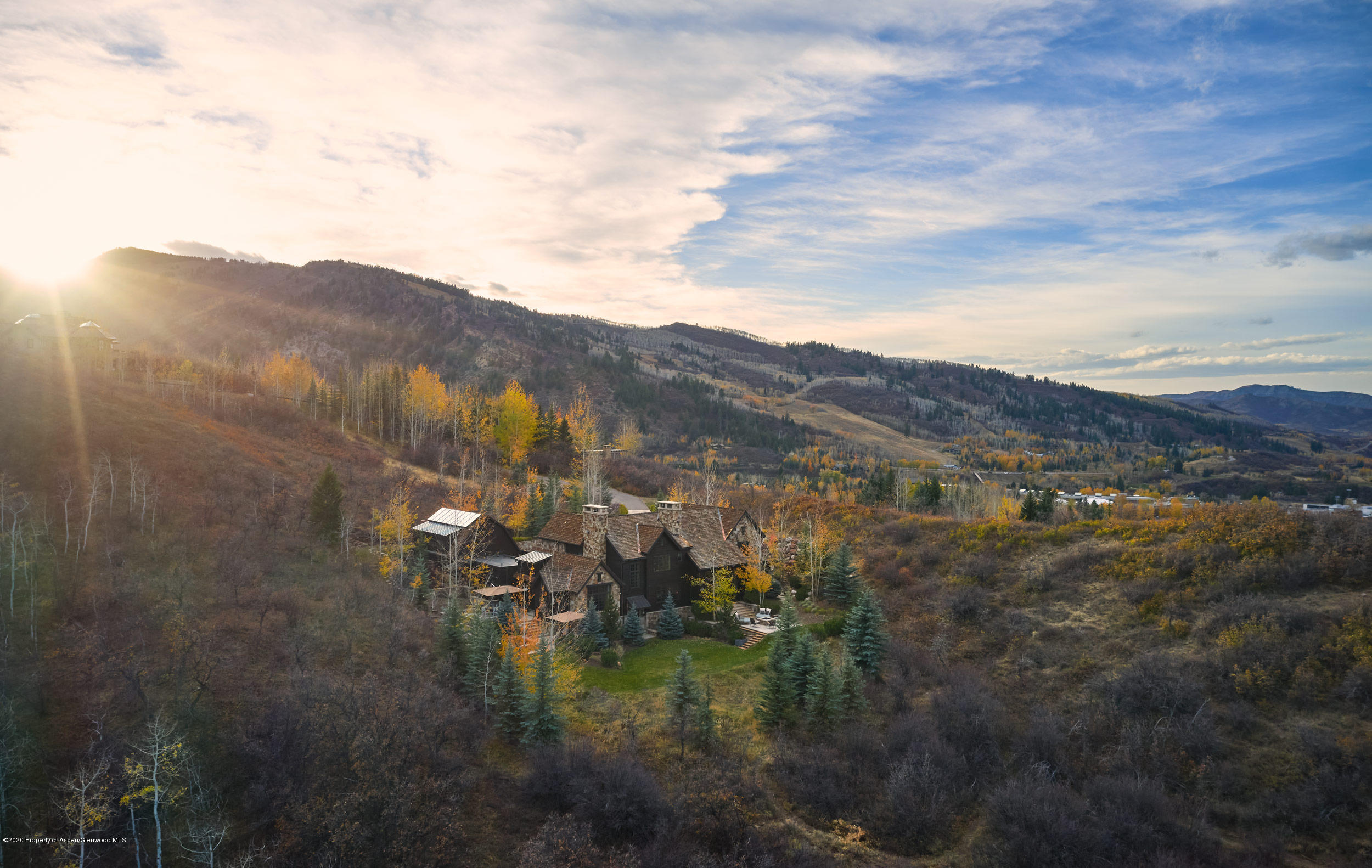 864 Moore Drive Aspen, CO 81611 - Photo 35 of 37 a view of a lake with mountains in the background
