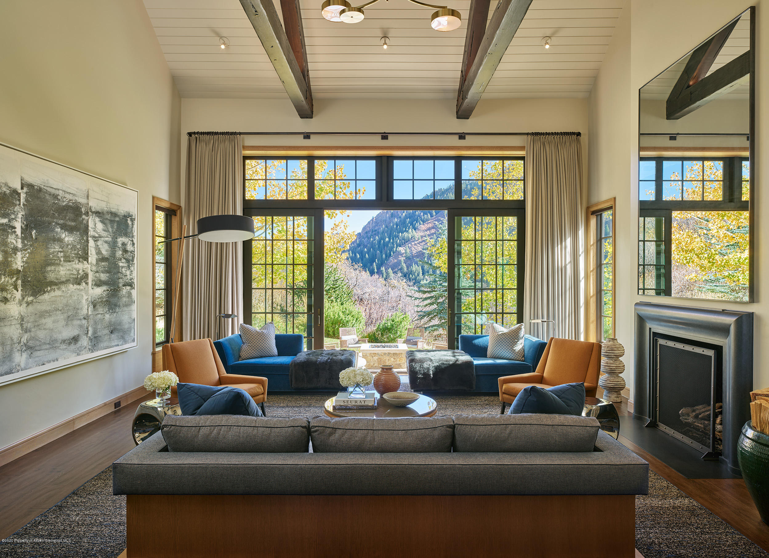 864 Moore Drive Aspen, CO 81611 - Photo 5 of 37 a living room with furniture and a large window