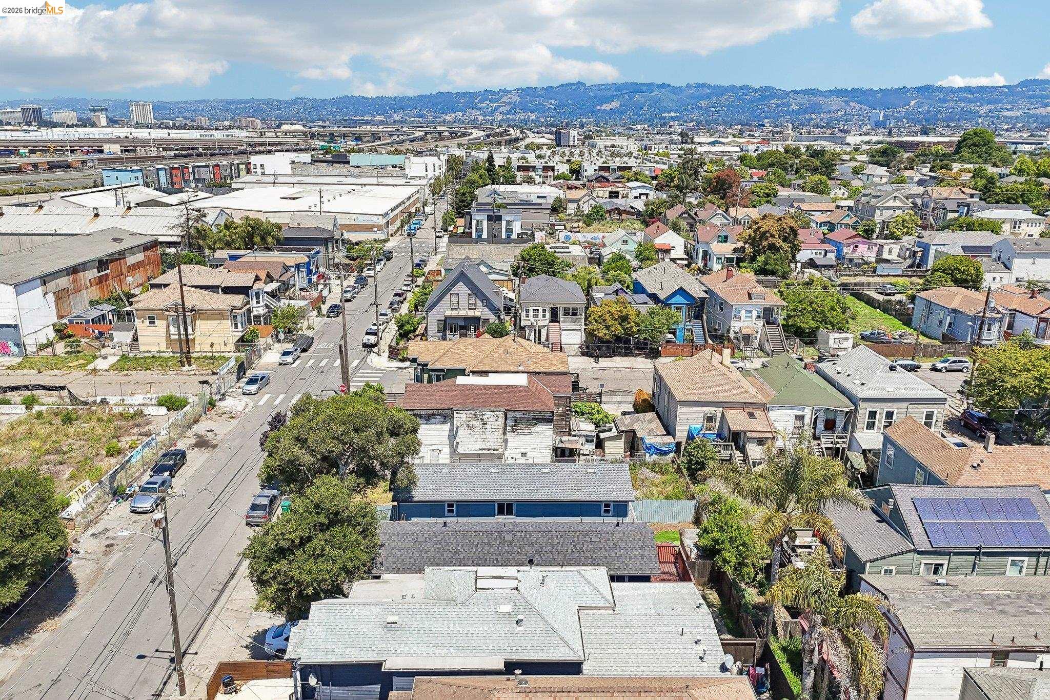 874 Pine Street Oakland, CA 94607 - Photo 33 of 39 Aerial perspective showcasing a residential street with diverse architectural styles