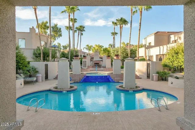 a view of a lake with a house in the background