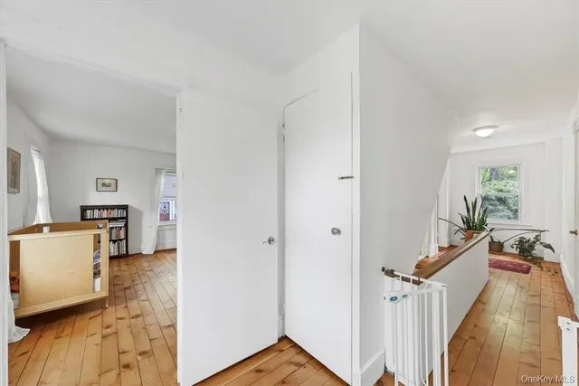 a view of a kitchen and an entryway with workspace