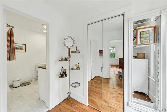 a bathroom with a glass shower door