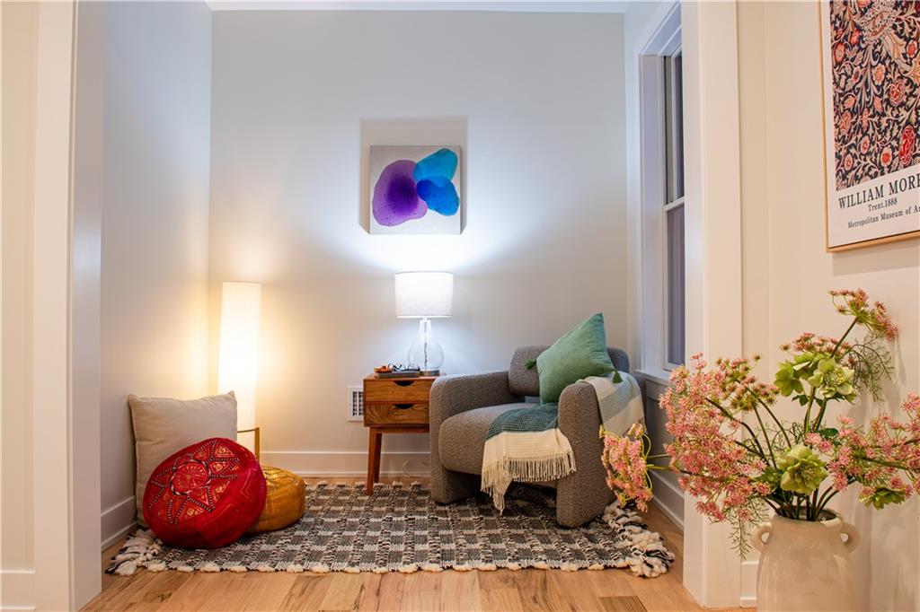 212 South Mathilda Street Pittsburgh, PA 15224 - Photo 19 of 38 a living room with furniture and a potted plant