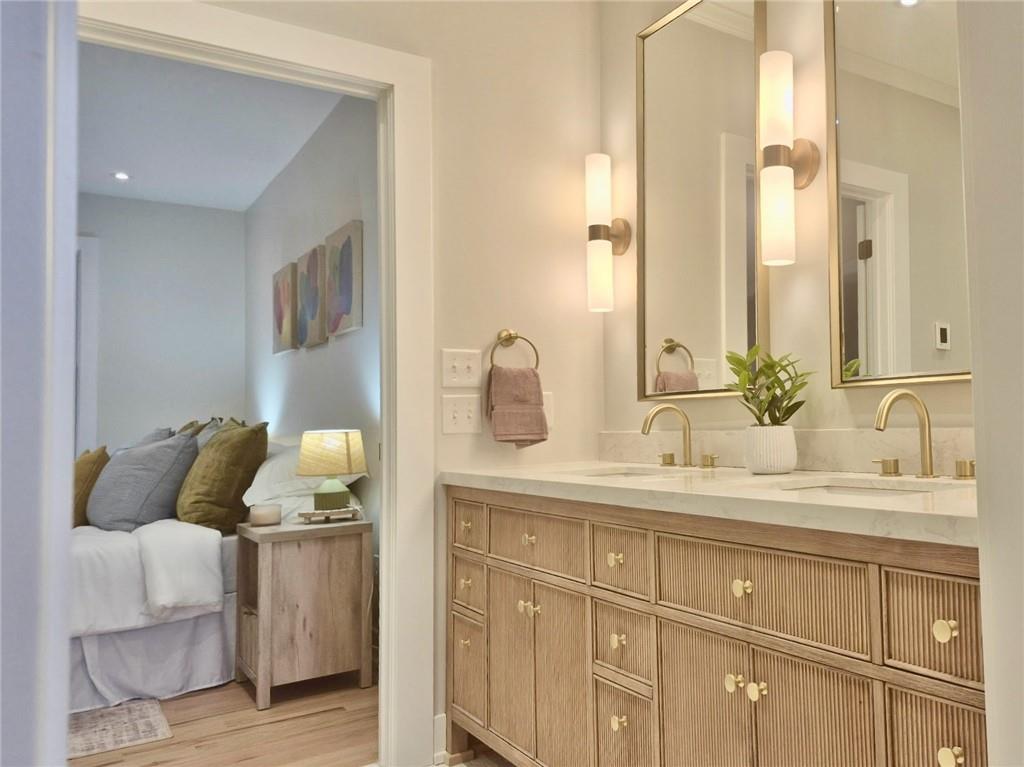212 South Mathilda Street Pittsburgh, PA 15224 - Photo 21 of 38 a bathroom with a sink and a mirror