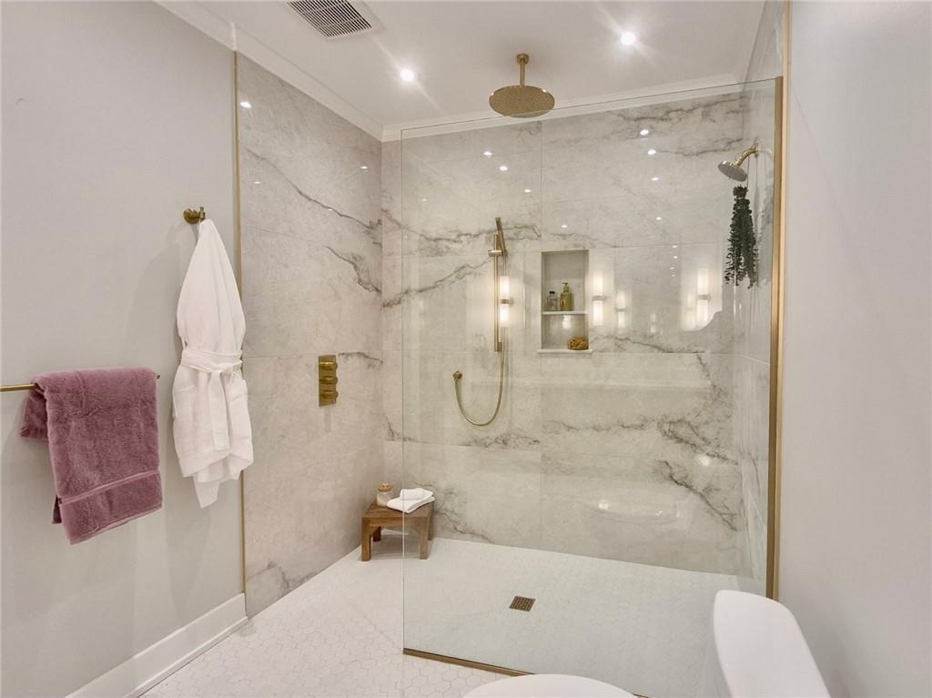 212 South Mathilda Street Pittsburgh, PA 15224 - Photo 22 of 38 a bathroom with a granite countertop bathtub shower sink and toilet