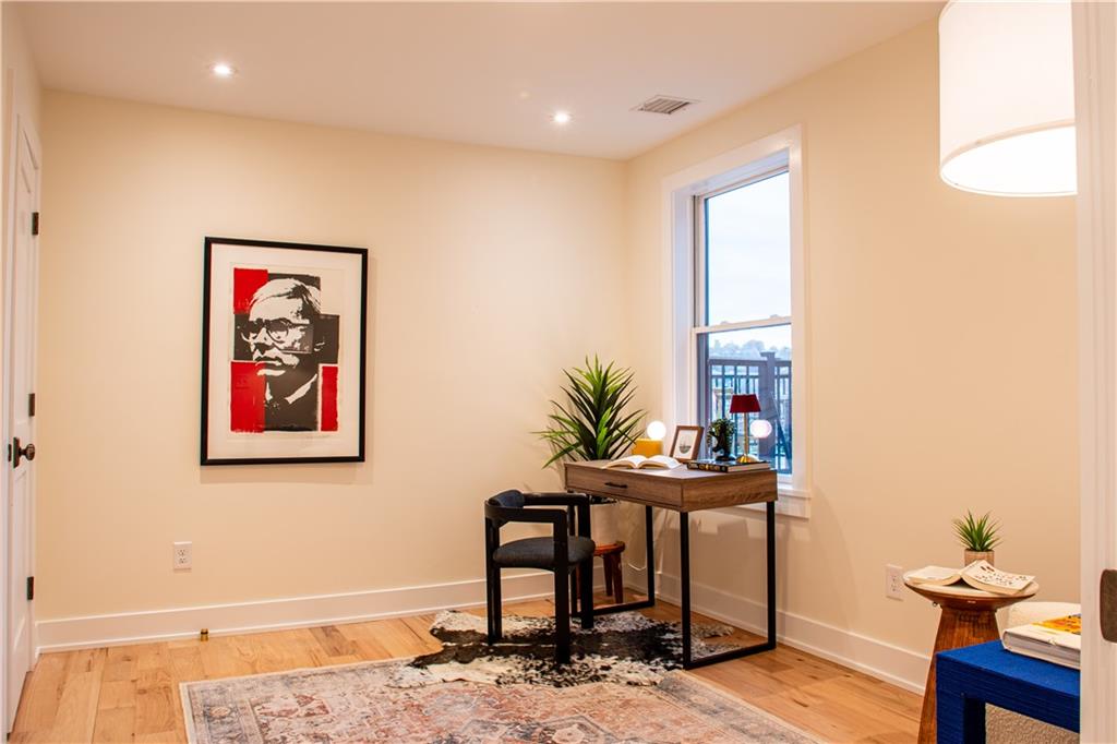 212 South Mathilda Street Pittsburgh, PA 15224 - Photo 30 of 38 a view of a workspace with furniture and a potted plant