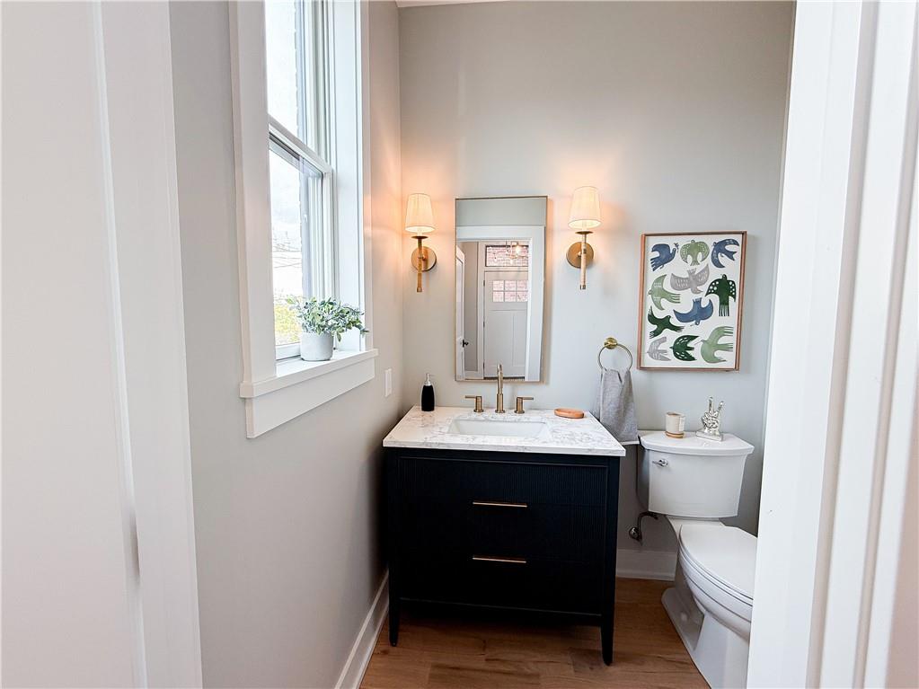 212 South Mathilda Street Pittsburgh, PA 15224 - Photo 35 of 38 a bathroom with a sink and a mirror