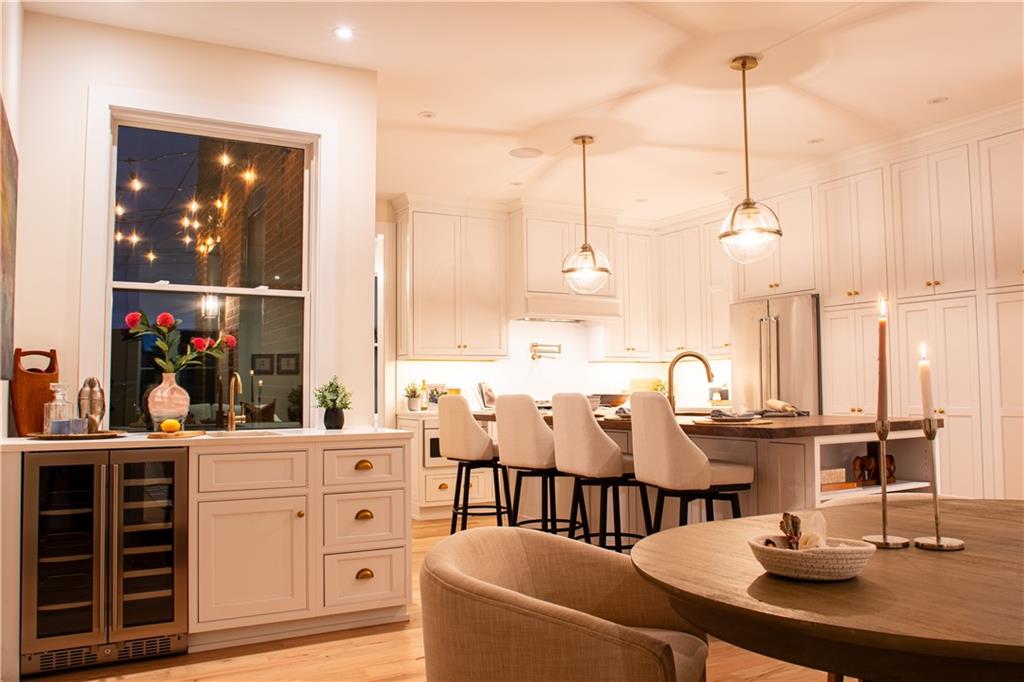 212 South Mathilda Street Pittsburgh, PA 15224 - Photo 10 of 38 a view of dining table chairs and chandelier