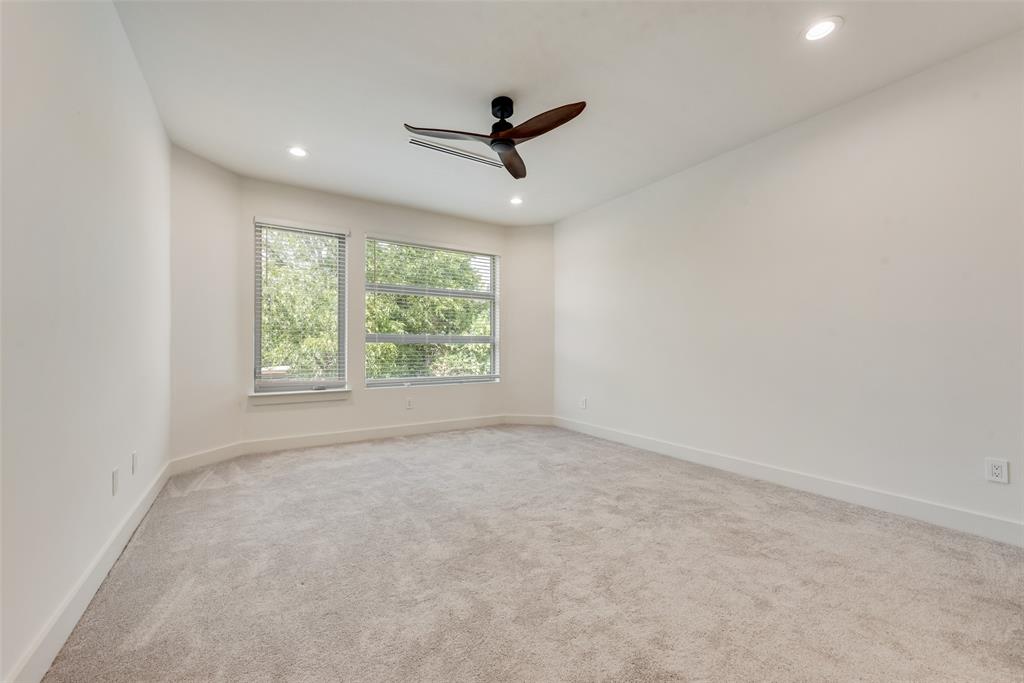 6411 Royal Lane Dallas, TX 75230 - Photo 27 of 35 an empty room with windows