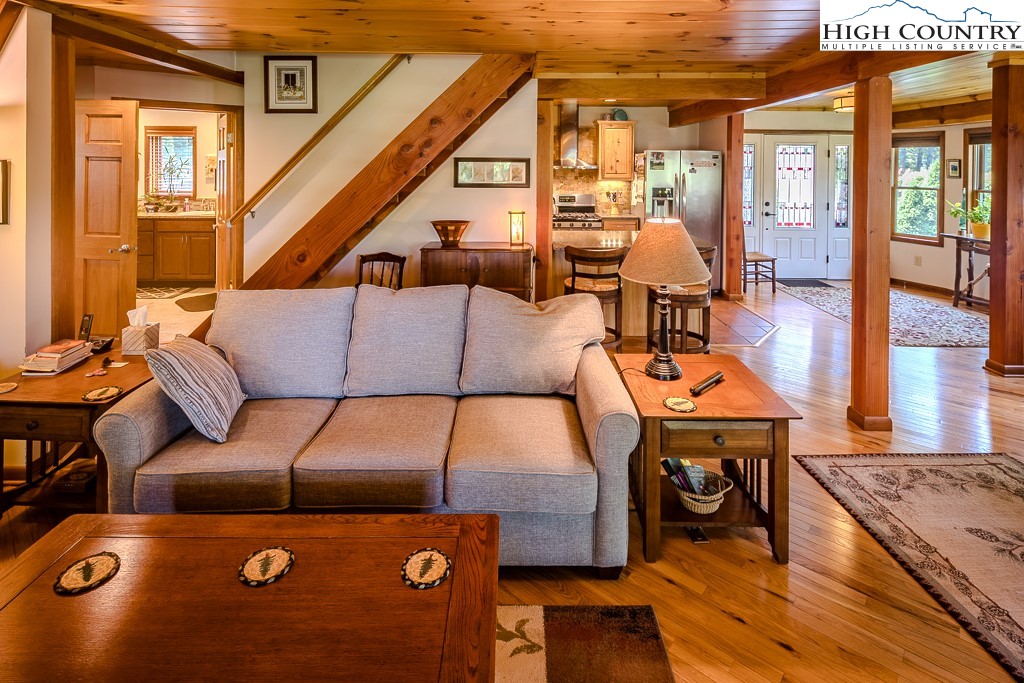 183 Rhododendron Loop Newland, NC 28657 - Photo 16 of 49 a living room with furniture and a table