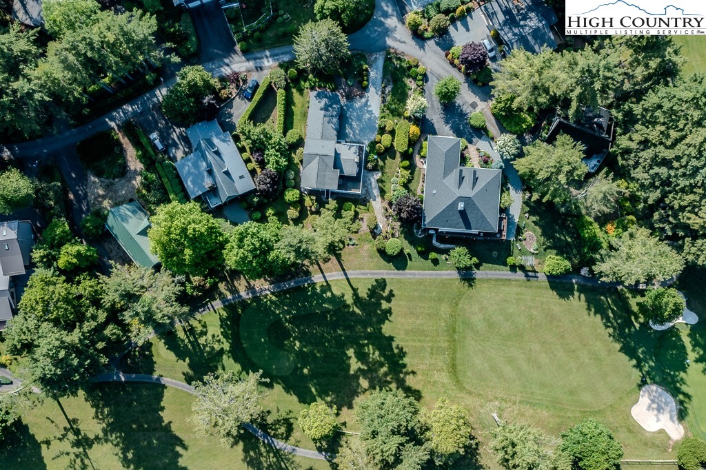 183 Rhododendron Loop Newland, NC 28657 - Photo 45 of 49 an aerial view of residential house with outdoor space and trees all around