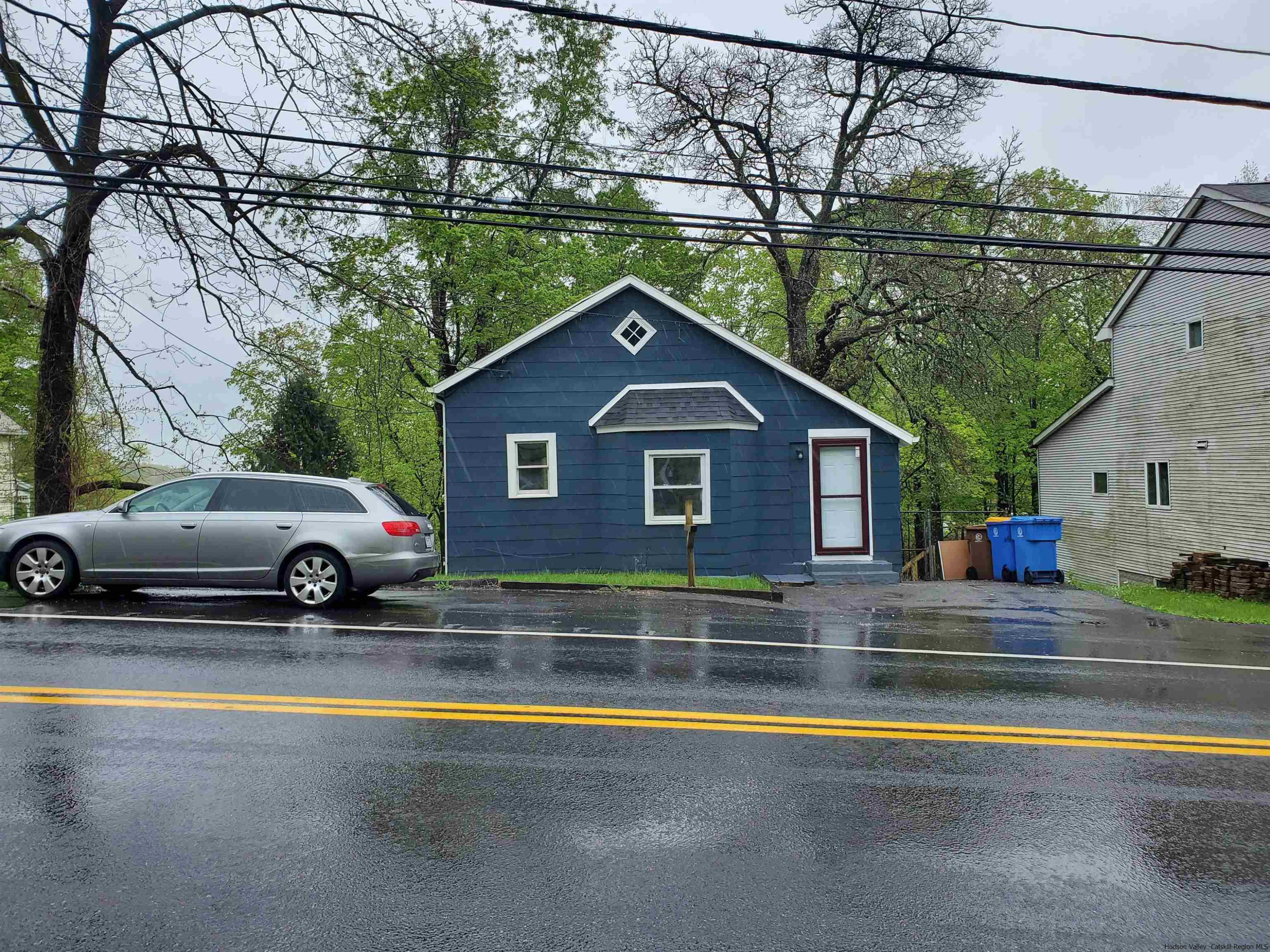 326 Boulevard Kingston, NY 12401 - Photo 2 of 35 a view of parking area with a swimming pool