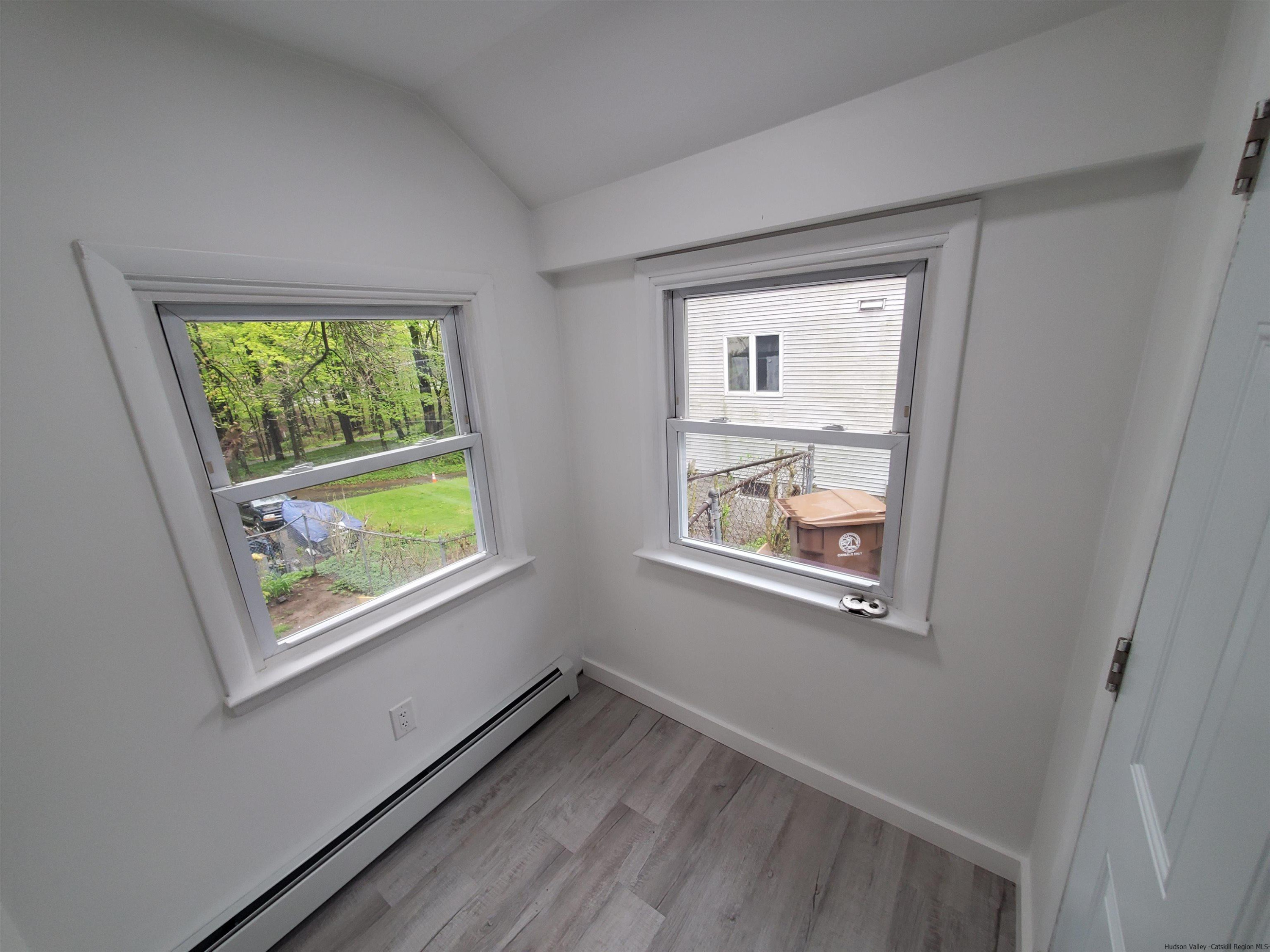 326 Boulevard Kingston, NY 12401 - Photo 3 of 35 an empty room with a window