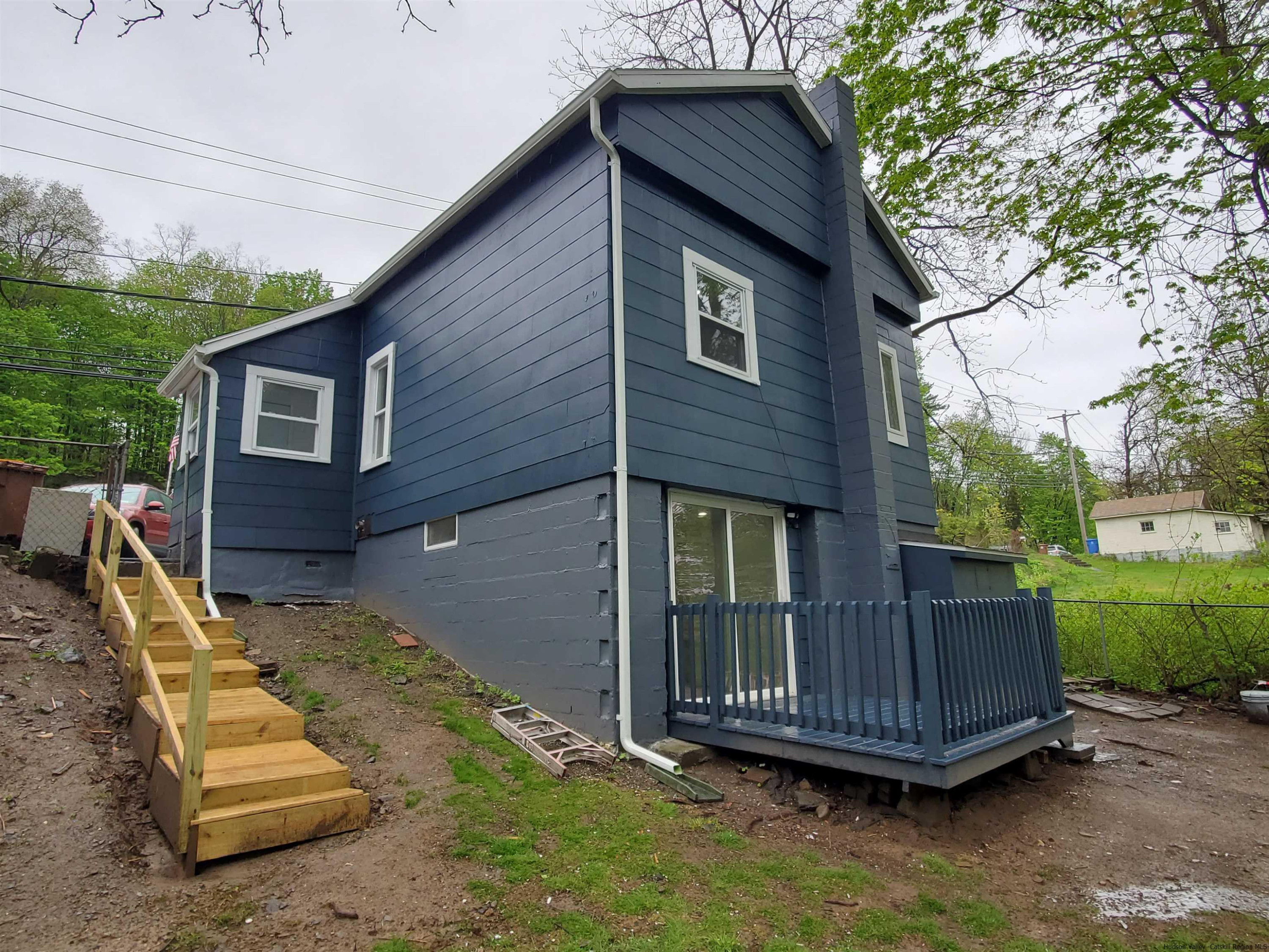 326 Boulevard Kingston, NY 12401 - Photo 35 of 35 a view of a house with wooden deck and yard