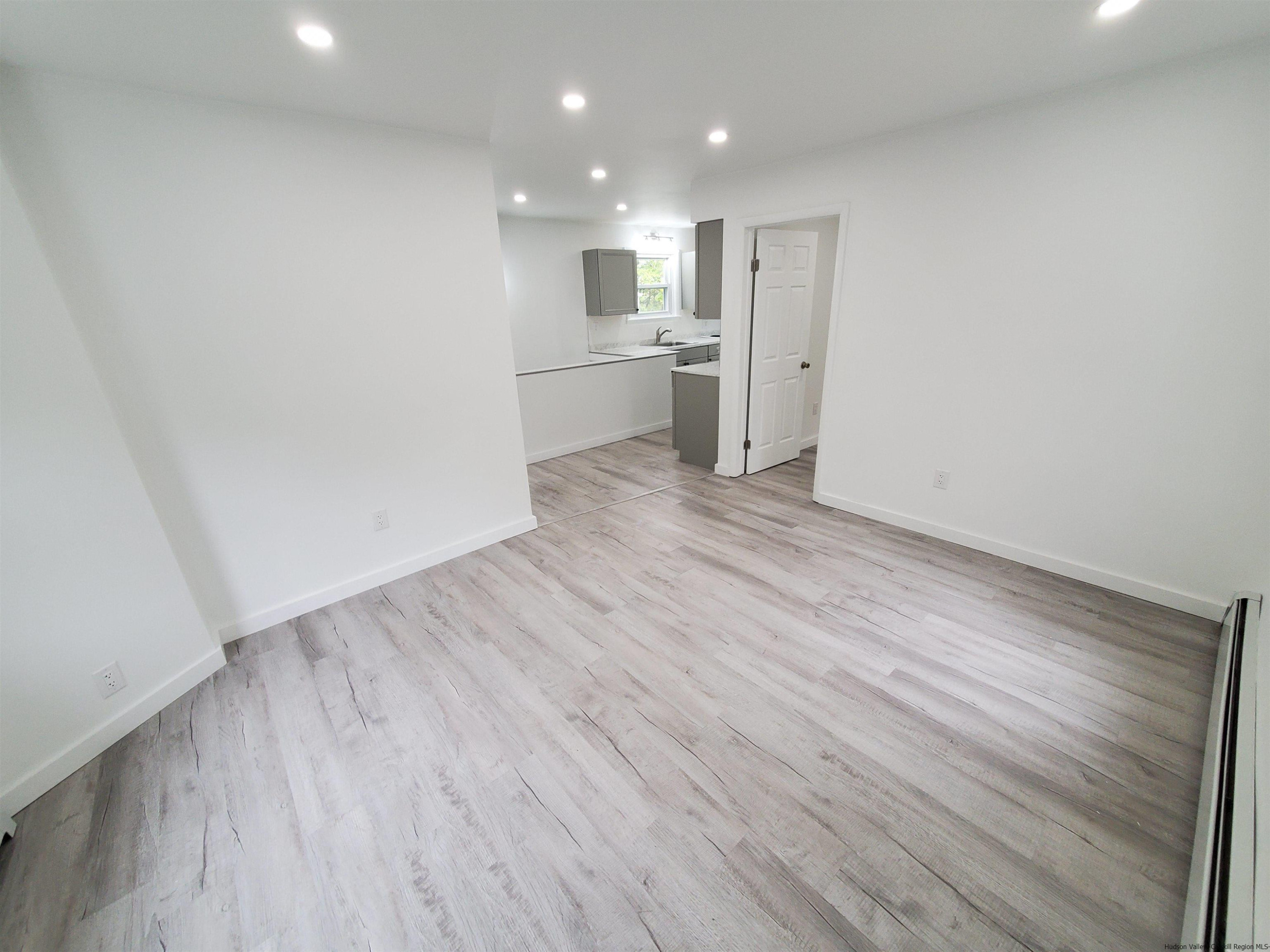 326 Boulevard Kingston, NY 12401 - Photo 5 of 35 a view of a kitchen with a sink and a refrigerator