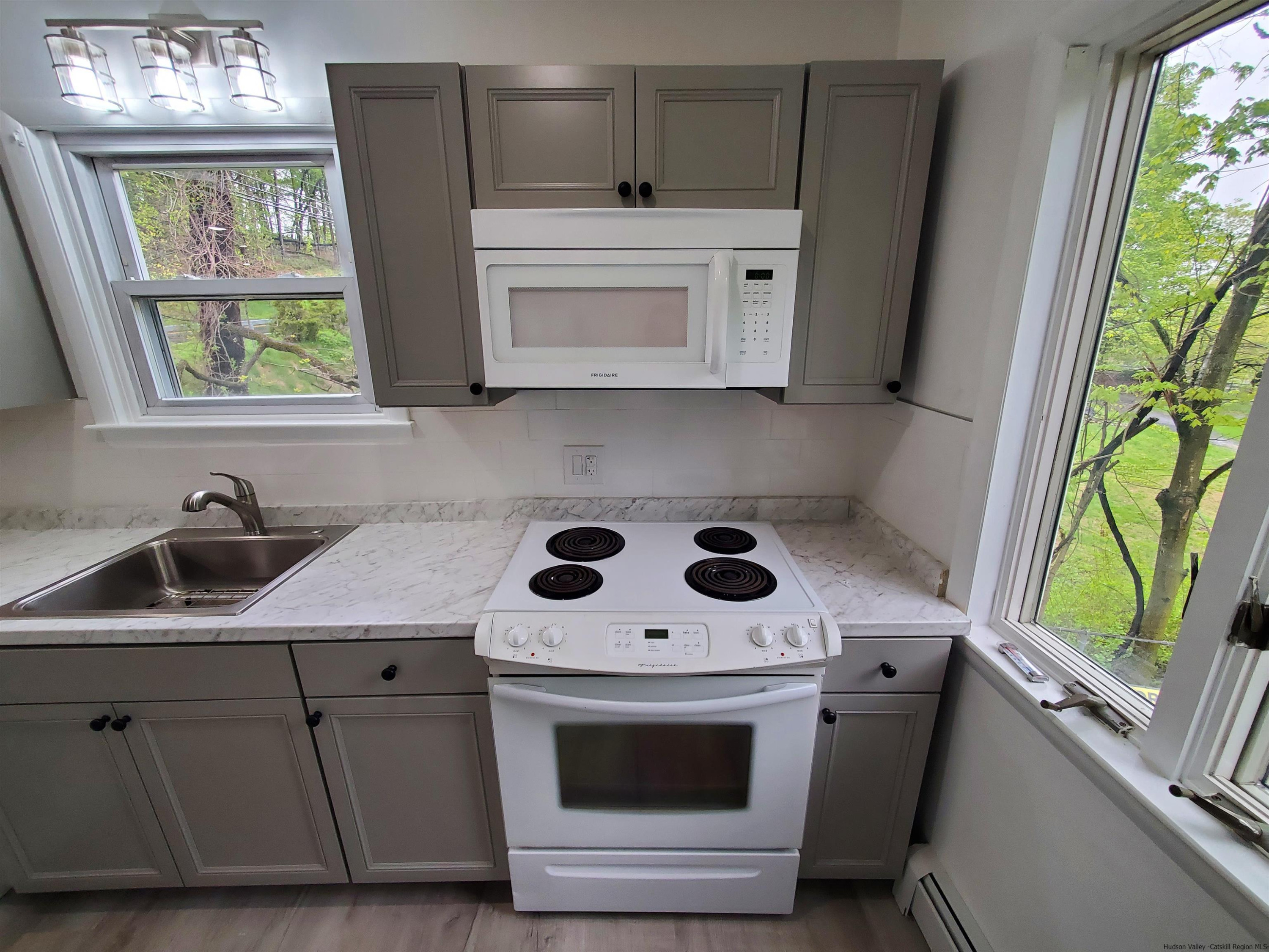 326 Boulevard Kingston, NY 12401 - Photo 10 of 35 a utility room with sink washer and dryer