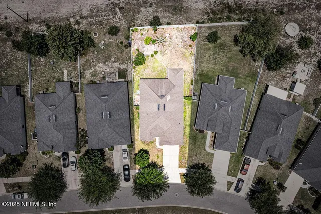 an aerial view of multiple house