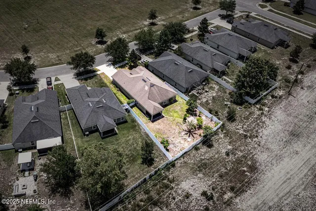a view of a swimming pool and an outdoor space