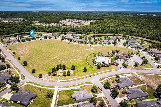 an aerial view of a swimming pool